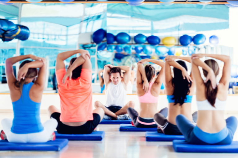 People in a yoga lesson at leisure centre