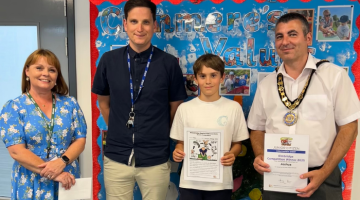 Junior citizen winner Joshua with the mayor of elmbridge, Cllr Hewens and school headmaster