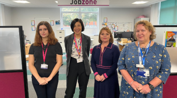 Representatives from Brooklands College, Elmbridge Borough Council and the DWP stand together